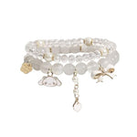 HASTHIP® 2pcs Crystal Bead Bracelet for Woman Girls Cinnamoroll Charm Friendship Bracelet for Girls, Dual Layered Cartoon Beige Elastic Bracelet for Women Girls Teens Birthday Christmas Gift