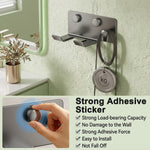 HASTHIP Wall-Mounted Hair Dryer Holder in Carbon Steel with U-Shaped Soft Rubber Support and Cord Hook