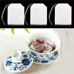 HASTHIP Disposable Tea Filter Bags for Loose Leaf Tea featuring Drawstring Design and 100 Pcs | Non Woven Fabric 2.16 x 2.75 in