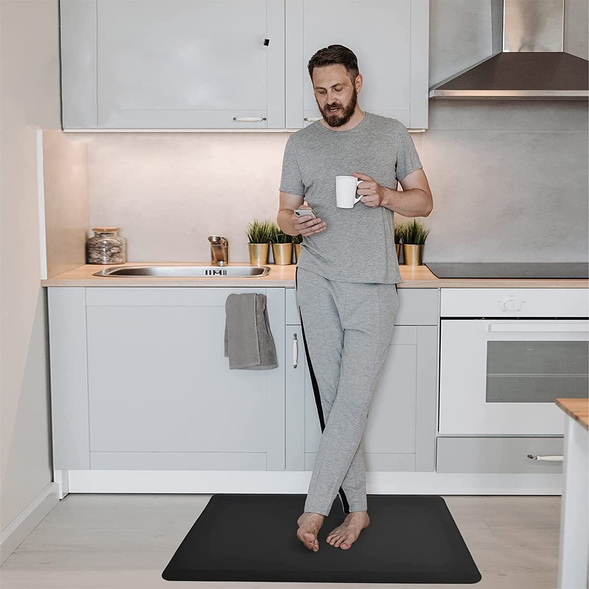 HASTHIP Kitchen Mats for Floor featuring Anti Slip Texture and Ergonomic Support 17 x 28 in Black