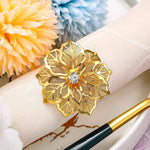 HASTHIP Napkin Rings for Dinner Table featuring Flower Rhinestone Design 6 Pcs Gold Set