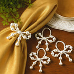 HASTHIP® 6 Pcs Pearl Bow Napkin Rings Elegant Imitation Pearl Bow Serviette Holders for Party Dinner Table Decor