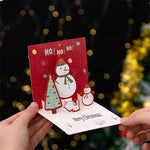 Merry Christmas card pictures family gifting scene beside decorated tree