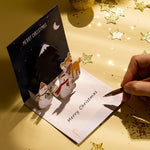 christmas greeting card reindeer pop-up, hand writing message, gold stars